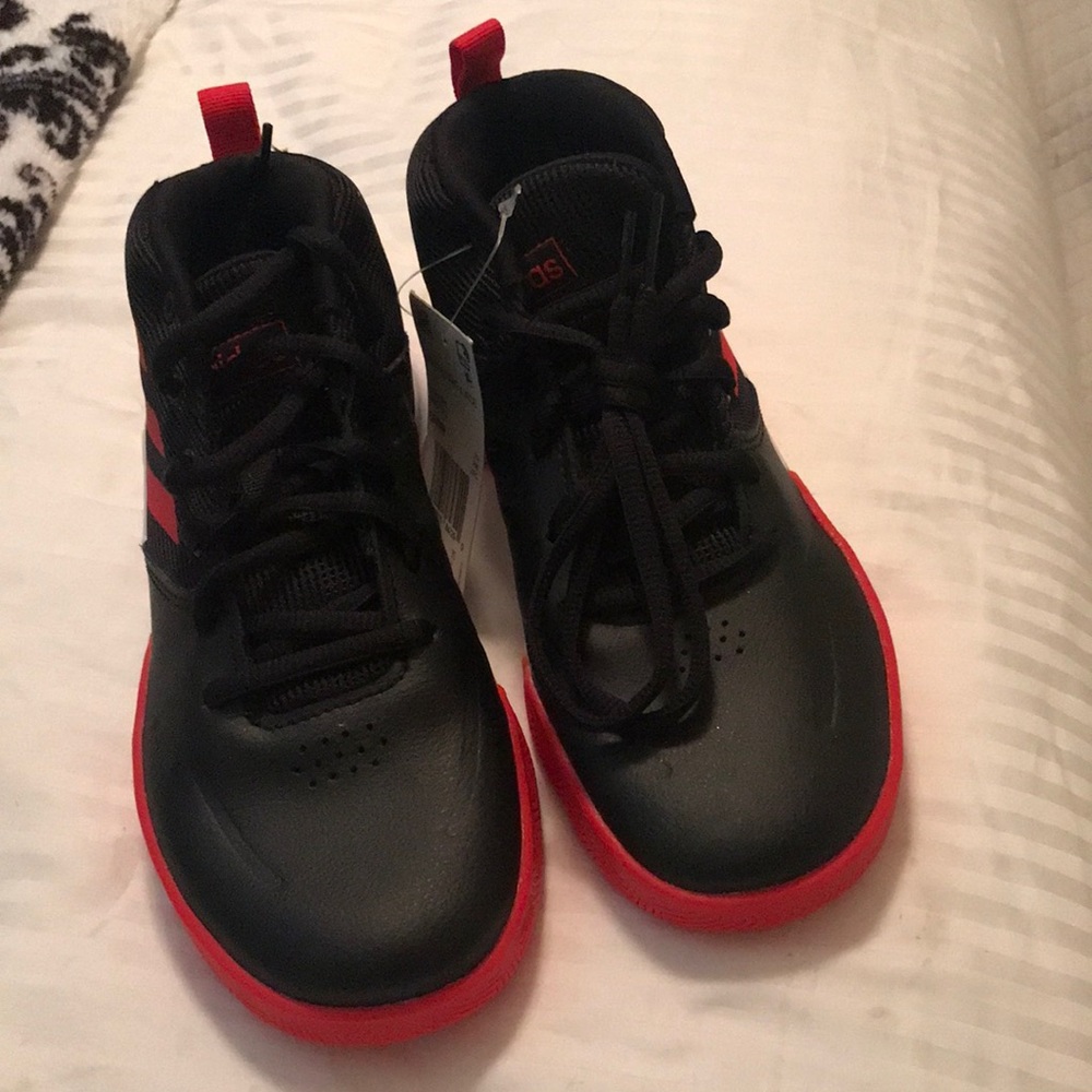 Adidas  own the game basket ball shoe
